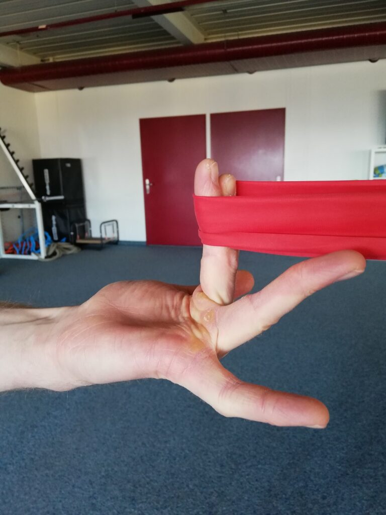 isometric hold for lumbrical injury with theraband