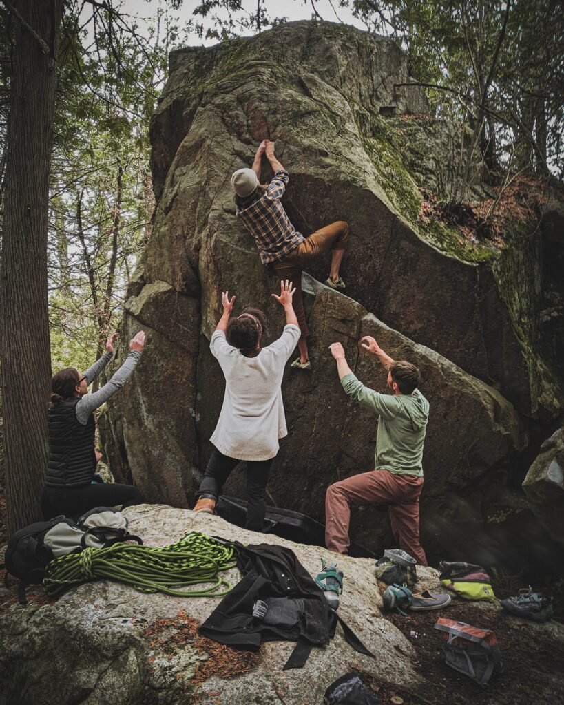 group of people bouldering