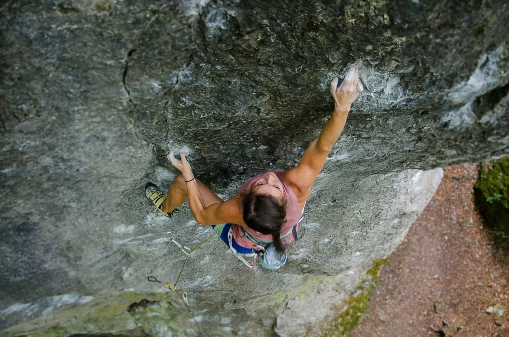 woman rock climbing